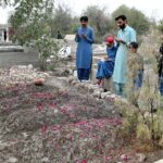 People are offering Fateha on the grave of his loved ones on the occasion of Shab-e-Barat at Abubakar Graveyard