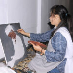 Students are participating in the Painting Competition organized by the Punjab Arts Council Multan