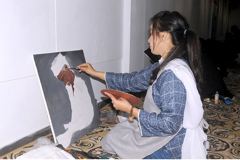 Students are participating in the Painting Competition organized by the Punjab Arts Council Multan