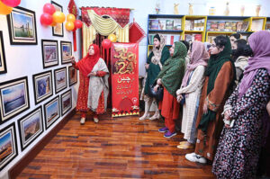 China Window official giving briefing visitors during celebration of Chinese New Year 2024 "Year of The Dragon" at China Window office