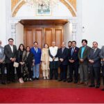 President Dr. Arif Alvi in a group photo with a delegation of the Lahore Chamber of Commerce and Industry, who called on him, at Governor House