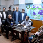 Director General Pakistan Broadcasting Corporation (PBC) Saeed Ahmed Sheikh, taking part in live transmission of program 'Surahi Sanjh' on World Radio Day during visit of Radio Pakistan Karachi