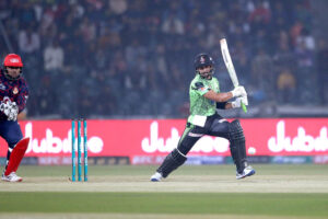 Lahore Qalanders batter Sahibzada Farhan playing shot during the Pakistan Super League (PSL) Twenty20 cricket match between Lahore Qalanders and Islamabad United at the Gaddafi Cricket Stadium