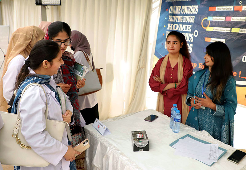 Participants visiting a stall during Job fair at Isra University