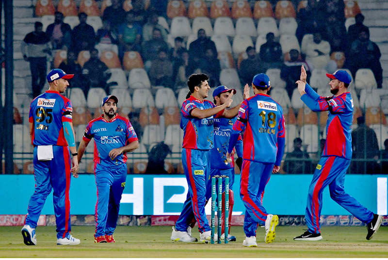 Multan Sultans batter Muhammad Rizwan plays a shot during the Pakistan Super League (PSL) Twenty20 cricket match between Multan Sultans and Karachi Kings at the Multan Cricket Stadium