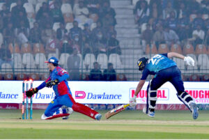 Karachi Kings wicketkeeper Saad Baig trying to run out the Multan Sultans batter Dawid Malan during the Pakistan Super League (PSL) Twenty20 cricket match plays between Multan Sultans and Karachi Kings at the Multan Cricket Stadium