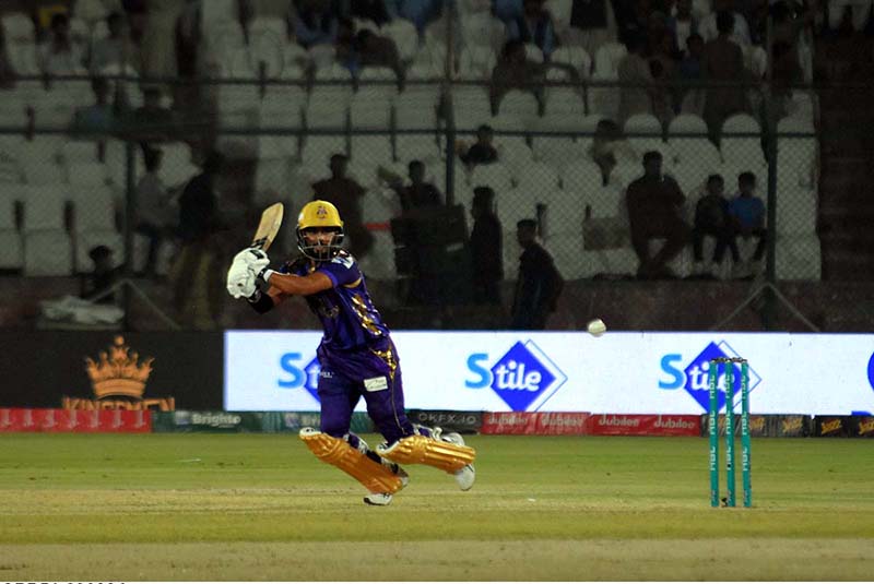 Karachi Kings’ batter Kieron Pollard plays a shot during the Pakistan Super League (PSL 9) Twenty20 cricket match between Karachi Kings and Quetta Gladiators at the National Cricket Stadium