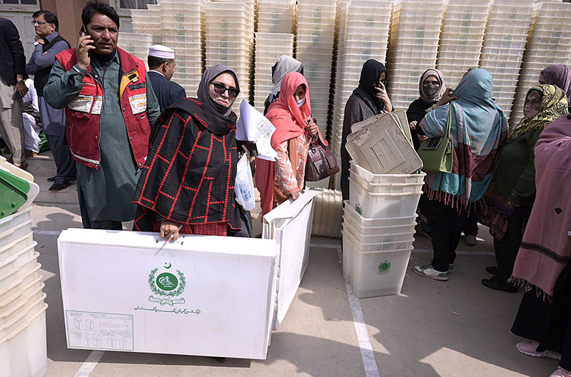 Polling staff receiving polling material at distribution Centre for General Elections 2024 Polling staff receiving polling material at distribution Centre for General Elections 2024