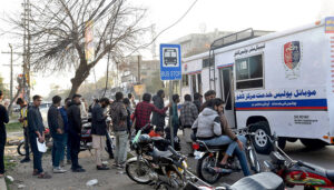 Job applications in the police department are being submitted by youths in the police mobile service in front of the police line, Empress Road.