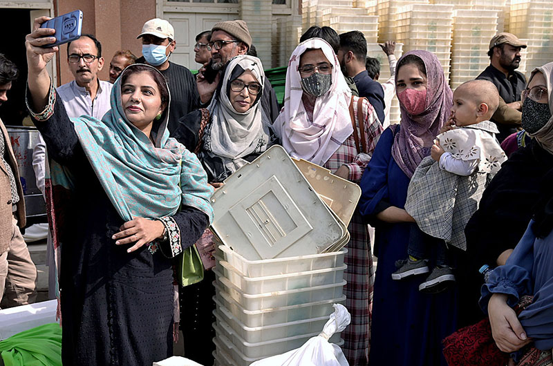 Polling staff receiving polling material at distribution Centre for General Elections 2024