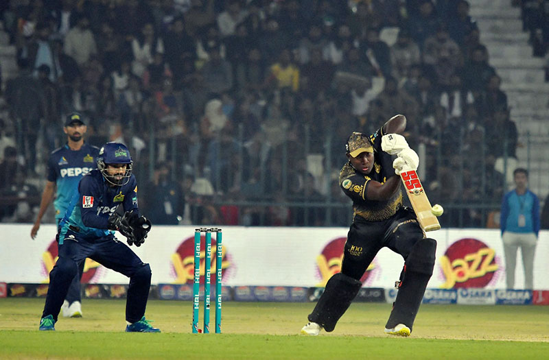 Peshawar Zalmi batter Rovman Powell plays a shot during the PSL-9 T20 cricket match between Multan Sultans and Peshawar Zalmi at the Multan Cricket Stadium