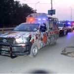 Security officials holding flag march in the city to develop a sense of protection among the masses and maintain law and order situation during the General Election 2024