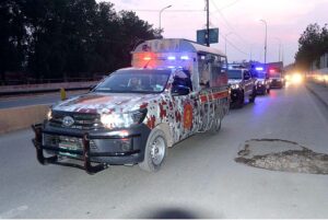 Security officials holding flag march in the city to develop a sense of protection among the masses and maintain law and order situation during the General Election 2024