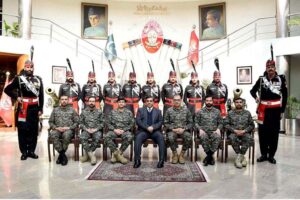 Caretaker Interior Minister Dr. Gohar Ejaz reciting Fatiha after laying wreaths on the martyrs' memorial at Pakistan Rangers (Punjab) Headquarters