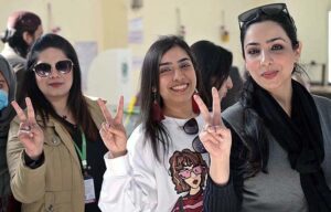 Women standing in queue waiting for their turn to cast their vote at polling station during General Election-2024.