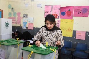 Women standing in queue waiting for their turn to cast their vote at polling station during General Election-2024.