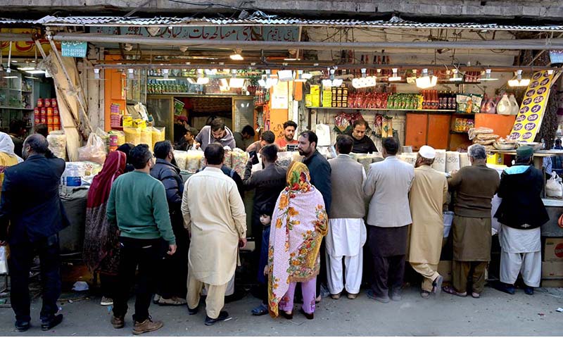 People purchasing food items in connection with upcoming Holy Fasting Month of Ramadan at Banni Chowk