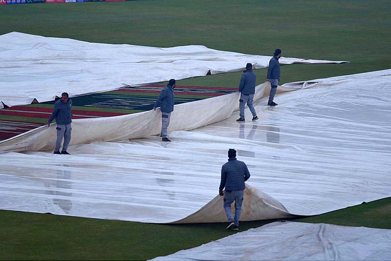 A view of covers on the pitch at Rawalpindi Cricket Stadium as the Pakistan Super League (PSL) season nine T20 cricket match between Lahore Qalandars and Peshawar Zalmi called off due to rain and wet outfield