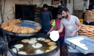 Workers preparing vermicelli at his workplace mostly used in holy Ramadan.