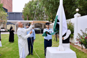 Ambassador Faisal Niaz Tirmizi, Pakistan’s Envoy to the United Arab Emirates hoisting the national flag during the National Day event at the Embassy