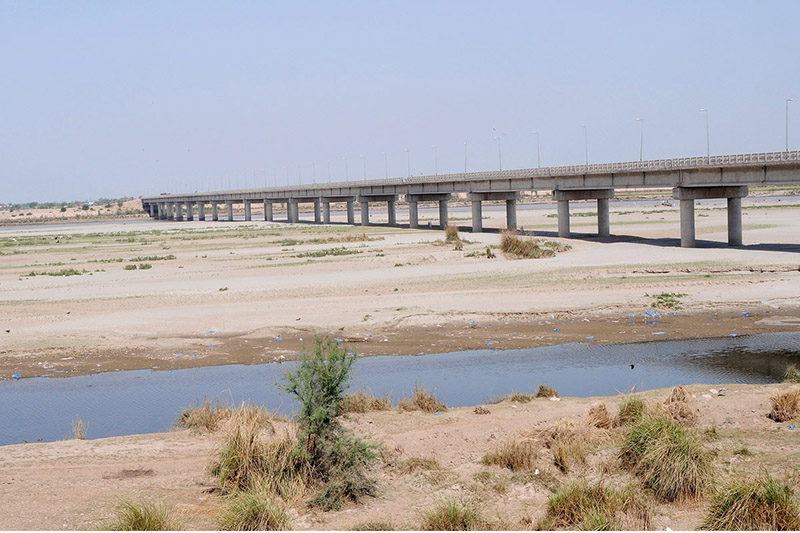 A view of the dry bed of the Chenab River at Head Muhammad Wala