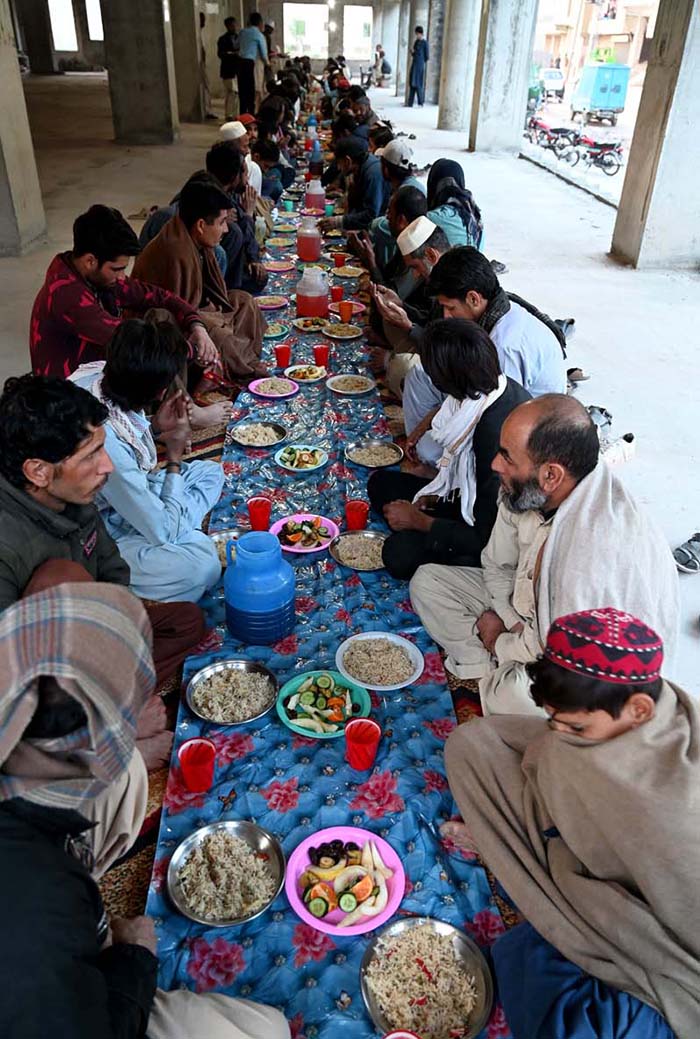A large number of people breaking fast (Iftar) during the holy month of Ramazan ul Mubarak.