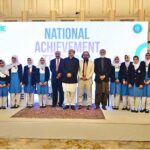 Federal Secretary (MoFEPT) Waseem Ajmal Chaudhry in a group photograph with students during the launching ceremony of National Achievement Test 2023 Assessing the Learning Environment organized by Pakistan Institute of Education