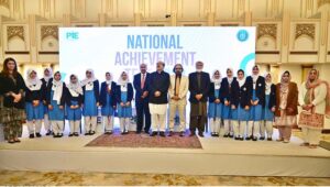 Federal Secretary (MoFEPT) Waseem Ajmal Chaudhry in a group photograph with students during the launching ceremony of National Achievement Test 2023 Assessing the Learning Environment organized by Pakistan Institute of Education