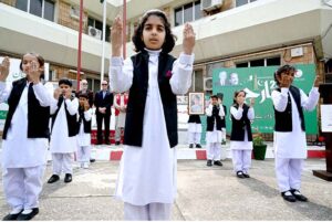 School Student volunteers performing on the occasion of Flag Hoisting in the presence of Secretary General PRCS, Abaid Ullah Khan, Representatives from Humanitarian organisations, Civil Society, Lawyers, Teachers and others -Staff of PRCS, IFRC, ICRC, Norwegian Red Cross, Turkish Red Crescent, German Red Cross and Volunteers at Pakistan Red Crescent Society, National Headquarters.