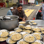 Volunteer organize Iftar for deserving people during the holy month of Ramazan ul Mubarak at roadside