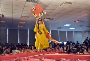 Students participating in Regional Dress fashion show organized in connection with Students Week celebrations held at FG Home Economics College F11/1