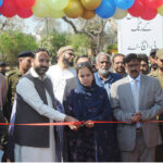 Commissioner Ms. Maryam Khan cutting the ribbon to inaugurate Jashan-e-Baharan festival organized by PHA at Qasim Bagh