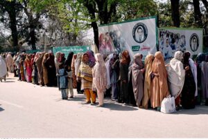 A large number of women standing in a queue to draw money from Benazir Income Support Programme (BISP) beneficiaries outside Benazir One Window Center at G-7.