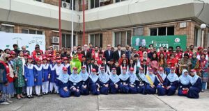 School Student volunteers performing on the occasion of Flag Hoisting in the presence of Secretary General PRCS, Abaid Ullah Khan, Representatives from Humanitarian organisations, Civil Society, Lawyers, Teachers and others -Staff of PRCS, IFRC, ICRC, Norwegian Red Cross, Turkish Red Crescent, German Red Cross and Volunteers at Pakistan Red Crescent Society, National Headquarters.