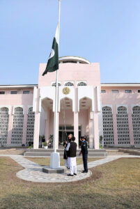 Ambassador of Pakistan to China, Khalil Hashmi raising the Pakistan flag at the ceremony to mark the national day hosted by Pakistan Embassy