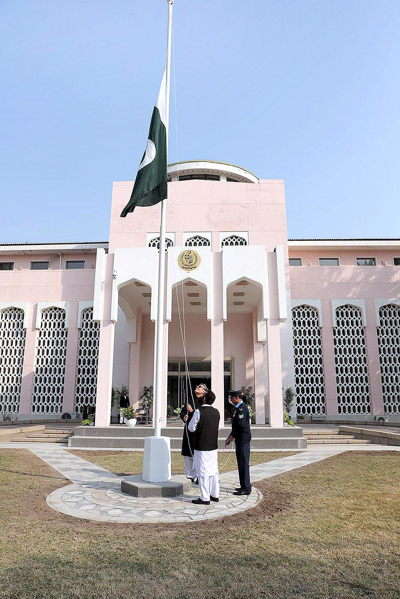 Ambassador of Pakistan to China, Khalil Hashmi raising the Pakistan flag at the ceremony to mark the national day hosted by Pakistan Embassy