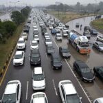 A view of massive traffic jam at Islamabad Expressway during rain that experienced the Federal Capital