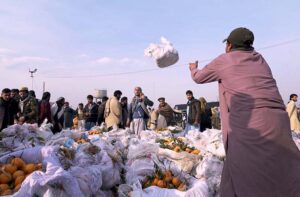 A large number of people purchasing fruits and vegetables in connection with upcoming Holy Month of Ramadan at Islamabad Fruit and vegetable market