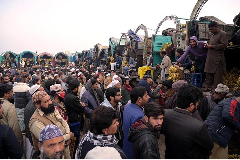 A large number of people purchasing fruits and vegetables in connection with upcoming Holy Month of Ramadan at Islamabad Fruit and vegetable market