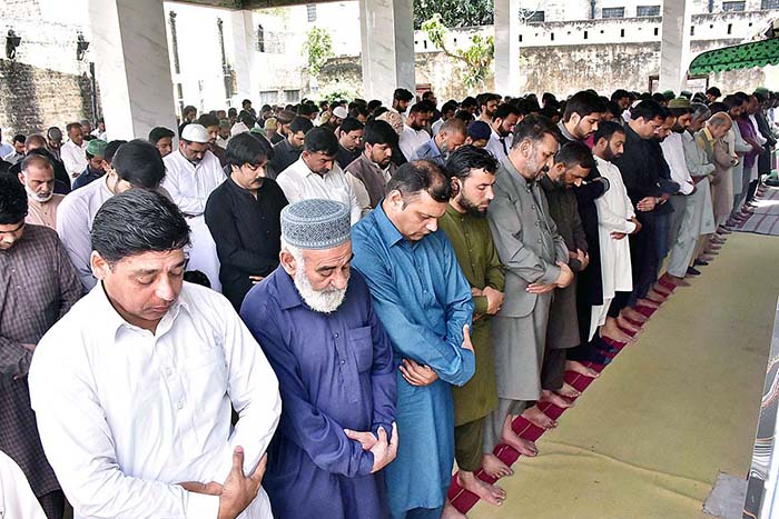 Large number of people offering 3rd Friday prayer of holy Ramadan Mubarak at Iqbal Jama masjid DC office.