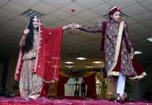 Students participating in Regional Dress fashion show organized in connection with Students Week celebrations held at FG Home Economics College F11/1