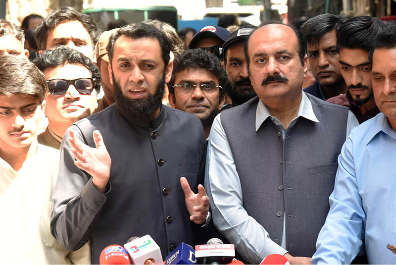 Federal Minister for Information and Broadcasting, Attaullah Tarar is talking to the media at Gwalmandi.