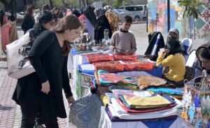 Women visiting stalls at 10th National Women at Work commemorating International Women's Day organised by Lok Virsa with the collaboration of Devcom-Pakistan and dtn.