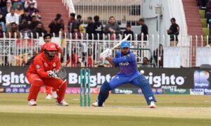 Multan Sultans batter Usman khan play a shot during the Pakistan Super League (PSL 9) Twenty20 cricket match between Multan Sultans and Islamabad United at Pindi Cricket Stadium