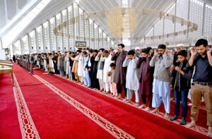 An aged person attends congregation prayer (Friday Prayer) at Faisal Masjid in the holy fasting month of Ramzan.
