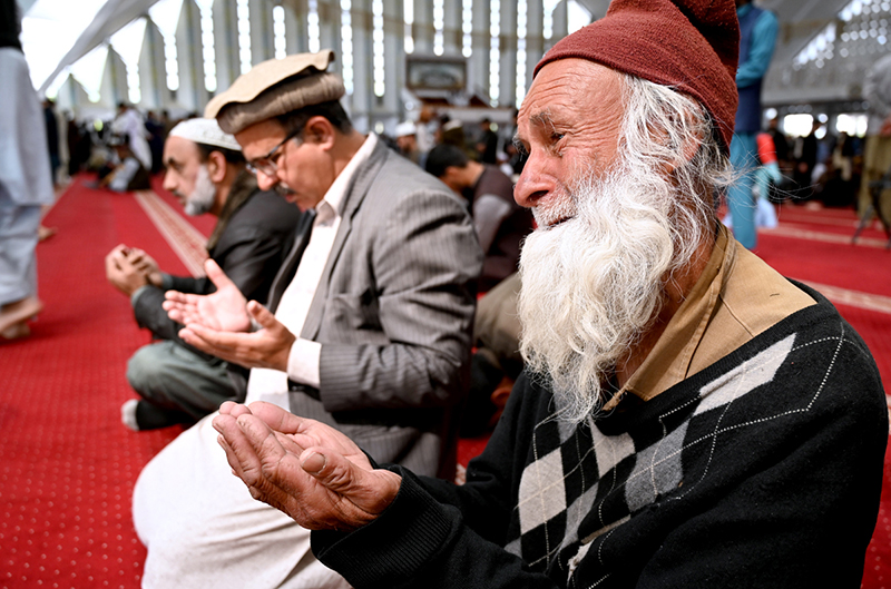 An aged person attends congregation prayer (Friday Prayer) at Faisal Masjid in the holy fasting month of Ramzan.