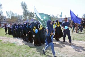 Students participating in Tug of War competition during 58th Annual Sports Festival 2024 at Government Graduate College Samanaabad.