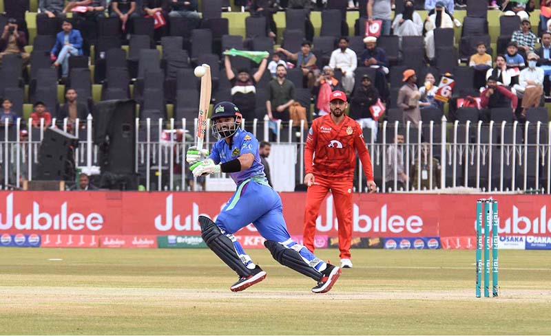 Multan Sultans batter Muhammad Rizwan play a shot during the Pakistan Super League (PSL 9) Twenty20 cricket match between Multan Sultans and Islamabad United at Pindi Cricket Stadium