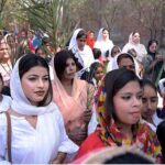 Pastor Adwar Zafar Akhtar leads Palm Sunday processions at UP Church Noori Gate
