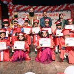 Students performing in tableau during annual prize distribution ceremony 2023-2024 of local school